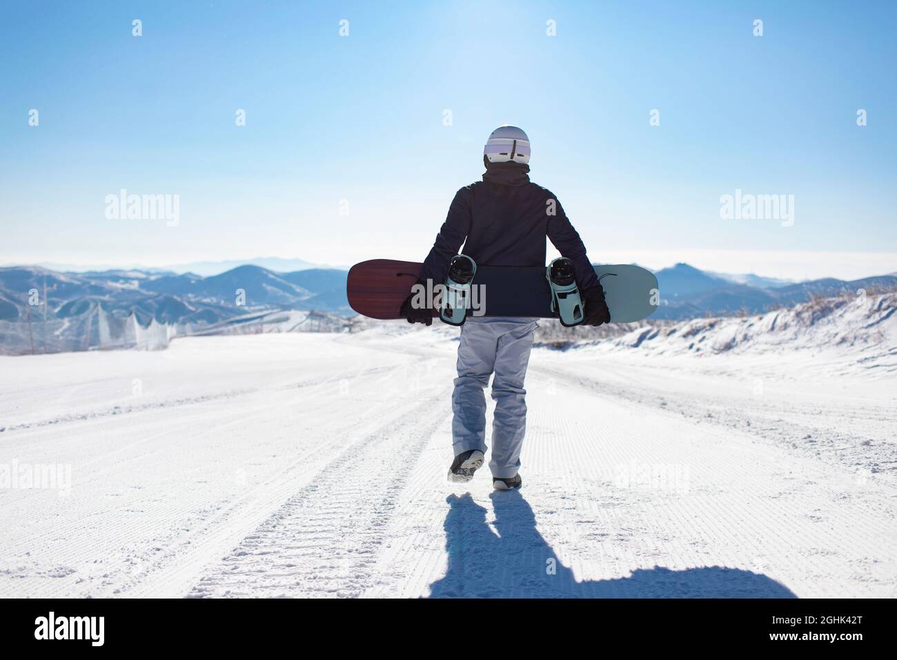 Snowboard rear view holding ski hi-res stock photography and images - Alamy
