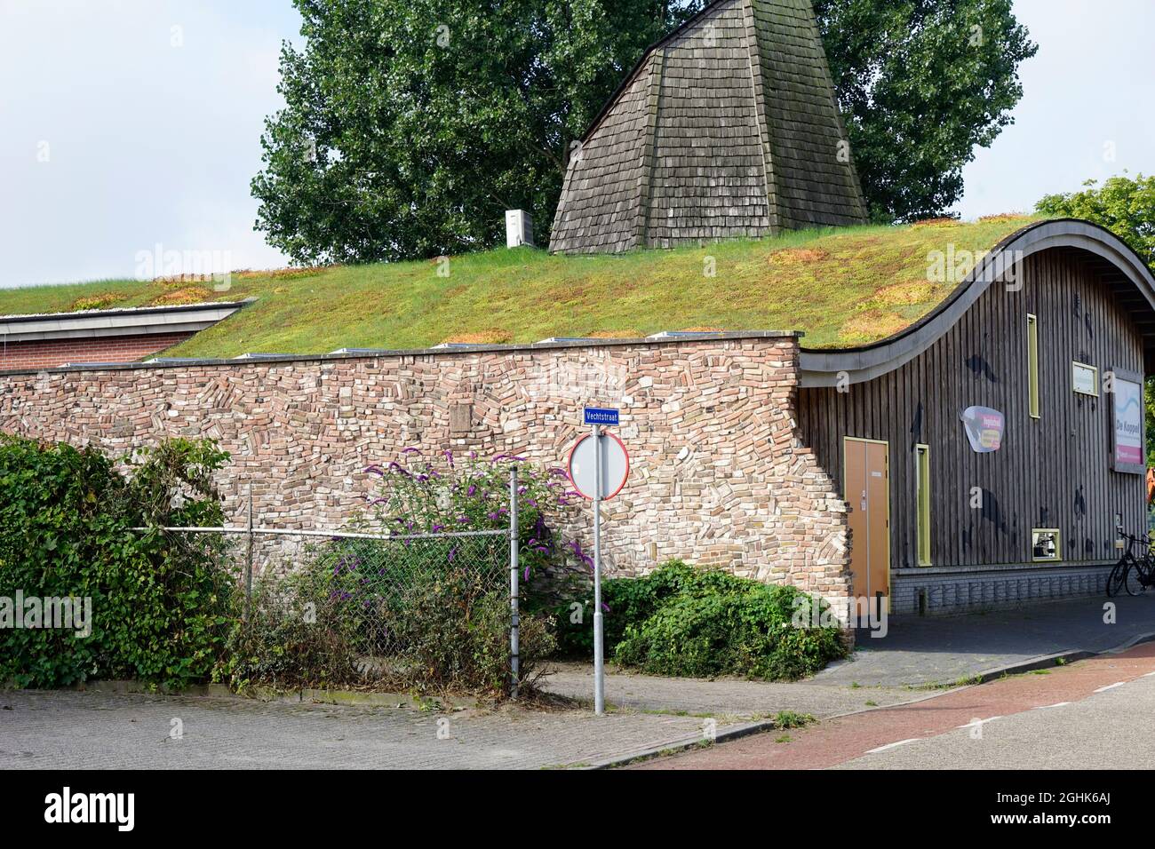 Hardenberg, the Netherlands - August 25 2021. The green roof of a nature information center in the Netherlands. A living roof is environment friendly Stock Photo