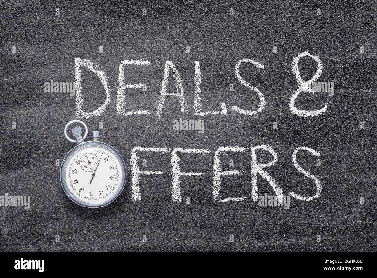 With The Offer Phrease deals and offers phrase written on chalkboard with vintage precise ...