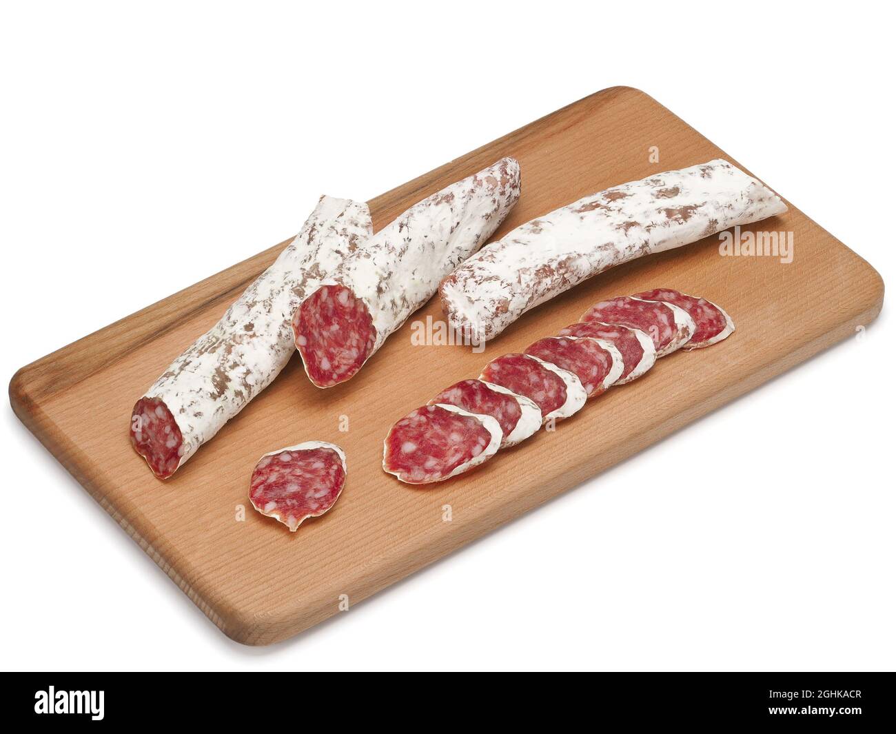 Traditional Spanish Fuet thin dried sausage with slices, Closeup