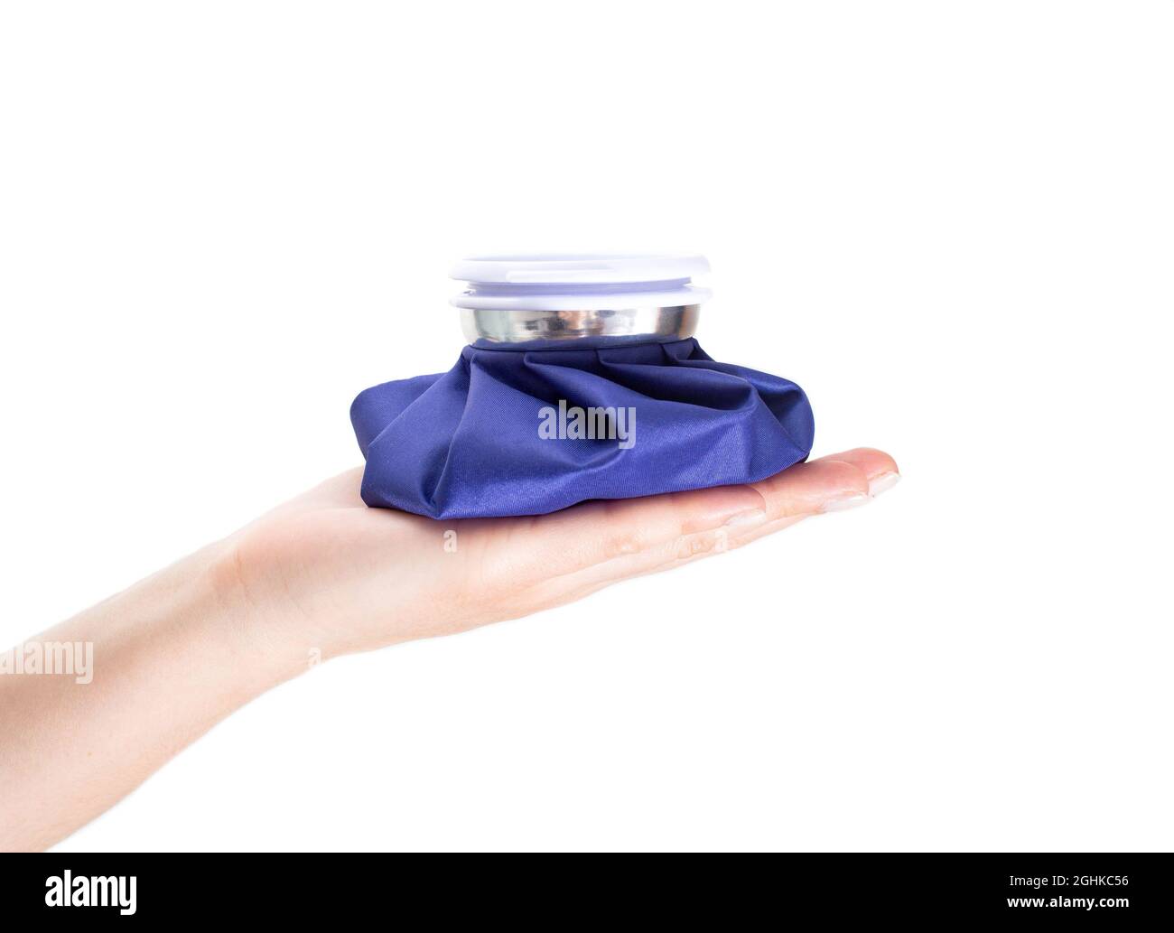 Blue medical ice bag on the palm, white background, isolate. Concept