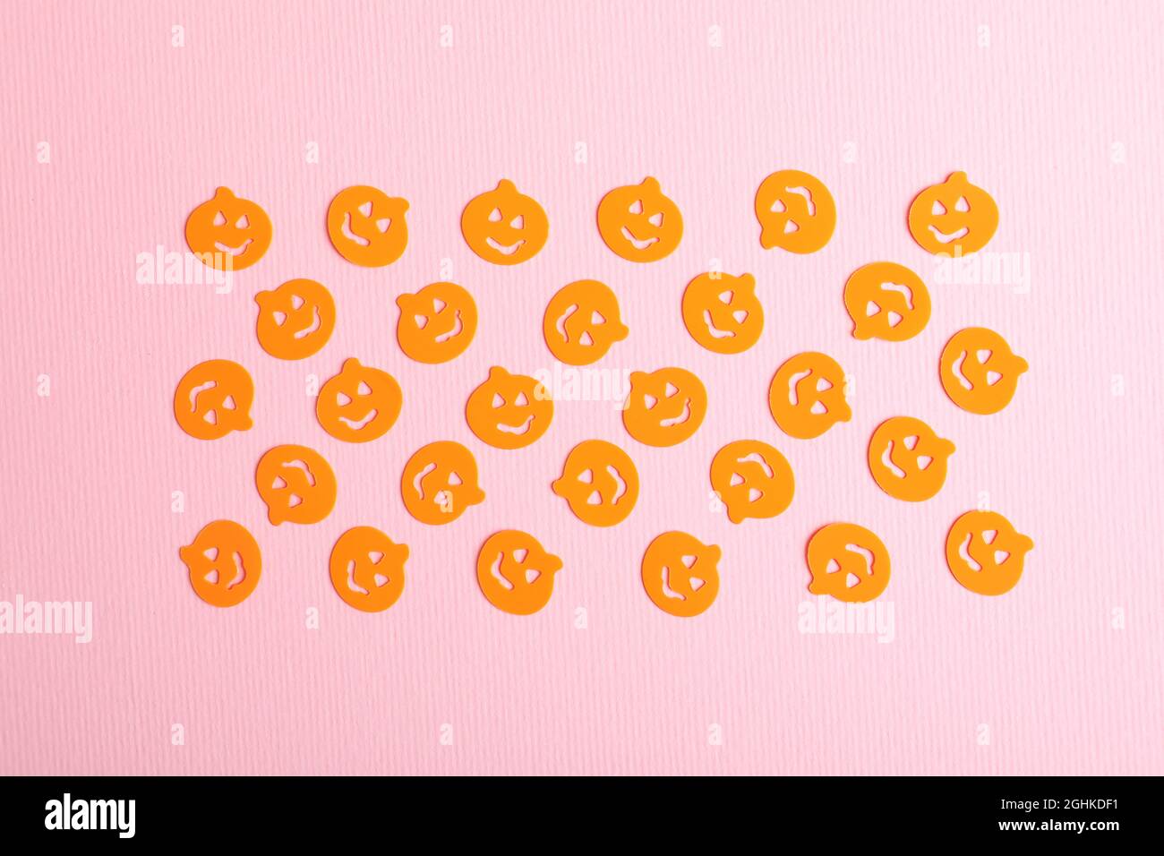 Flat lay composition with pumpkins on pink background Stock Photo - Alamy