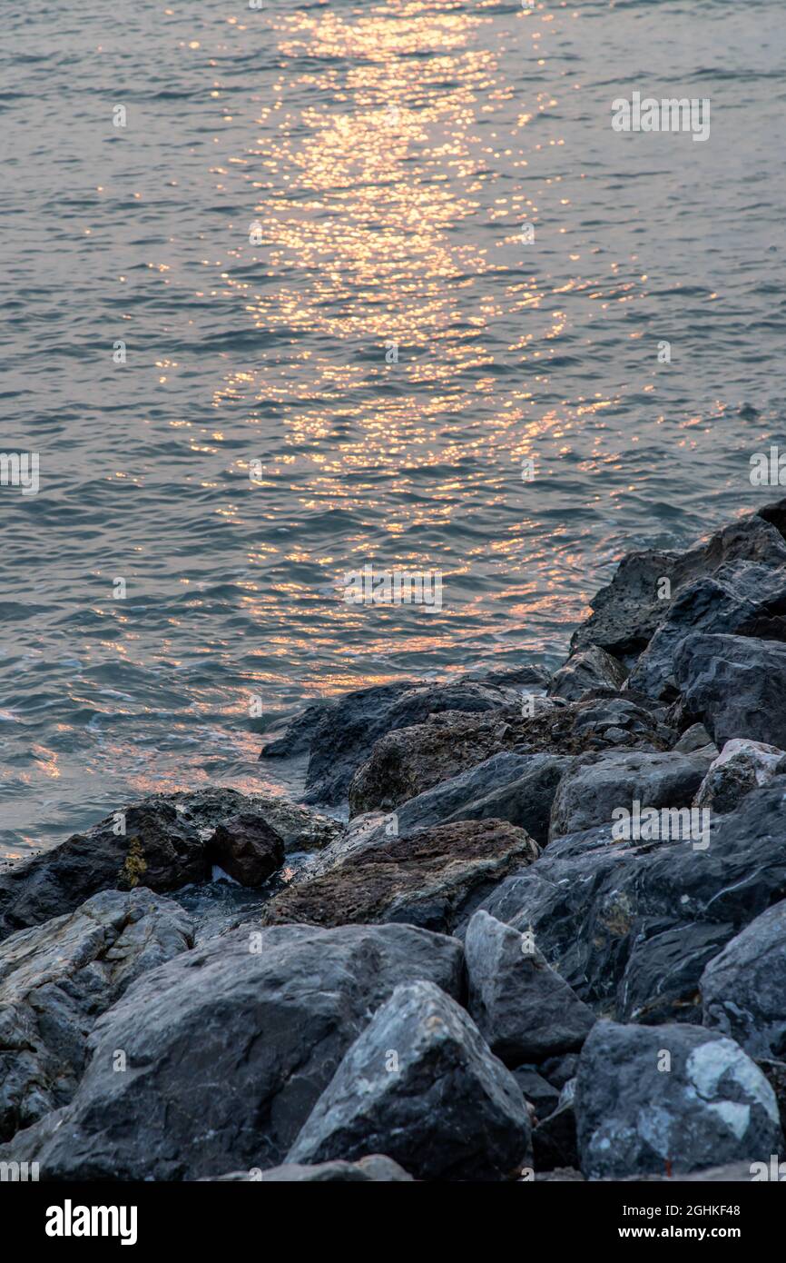 Rocks and sea : View of sea waves hitting rocks on the Calm beach in ...