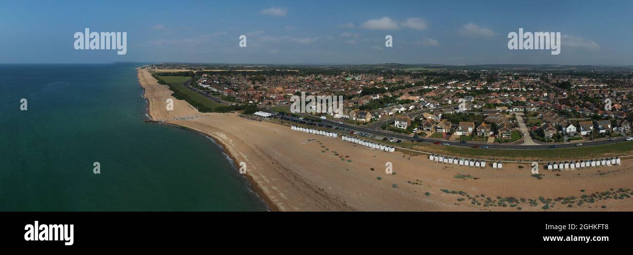 Goring by Sea beach with the popular Cafe and the greensward in view