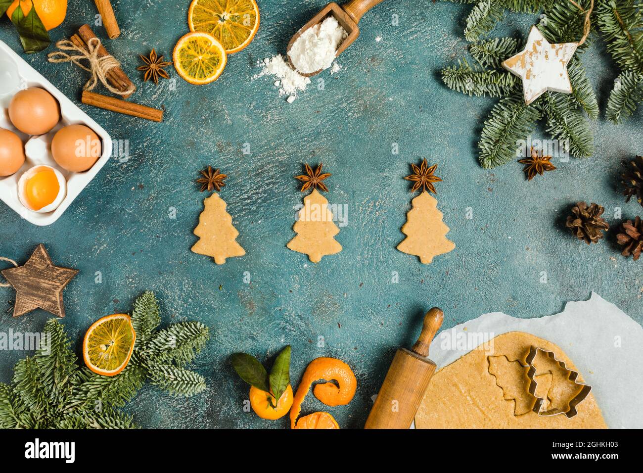 Holiday food. Ingredients for making Christmas ginger cookies small trees. Top view, concept Stock Photo