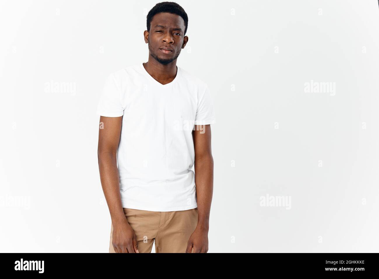 white T-shirt looks forward Stock Photo 