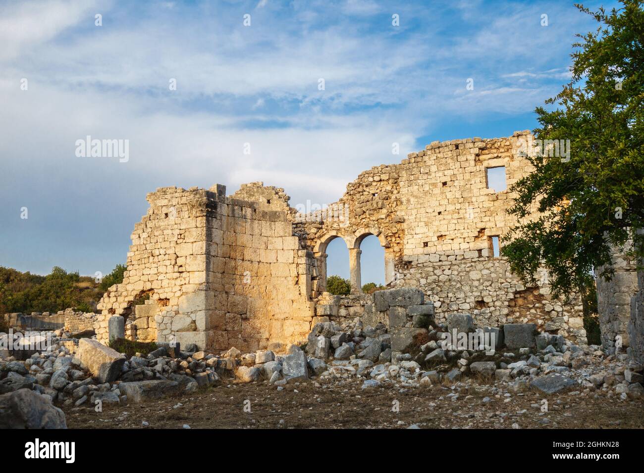 Ruins of building lighted by sunset lights in ancient city Kanli Divane or  Canytelis, Ayaş, Turkey. City was part of Roman Empire & then abandoned. No  Stock Photo - Alamy