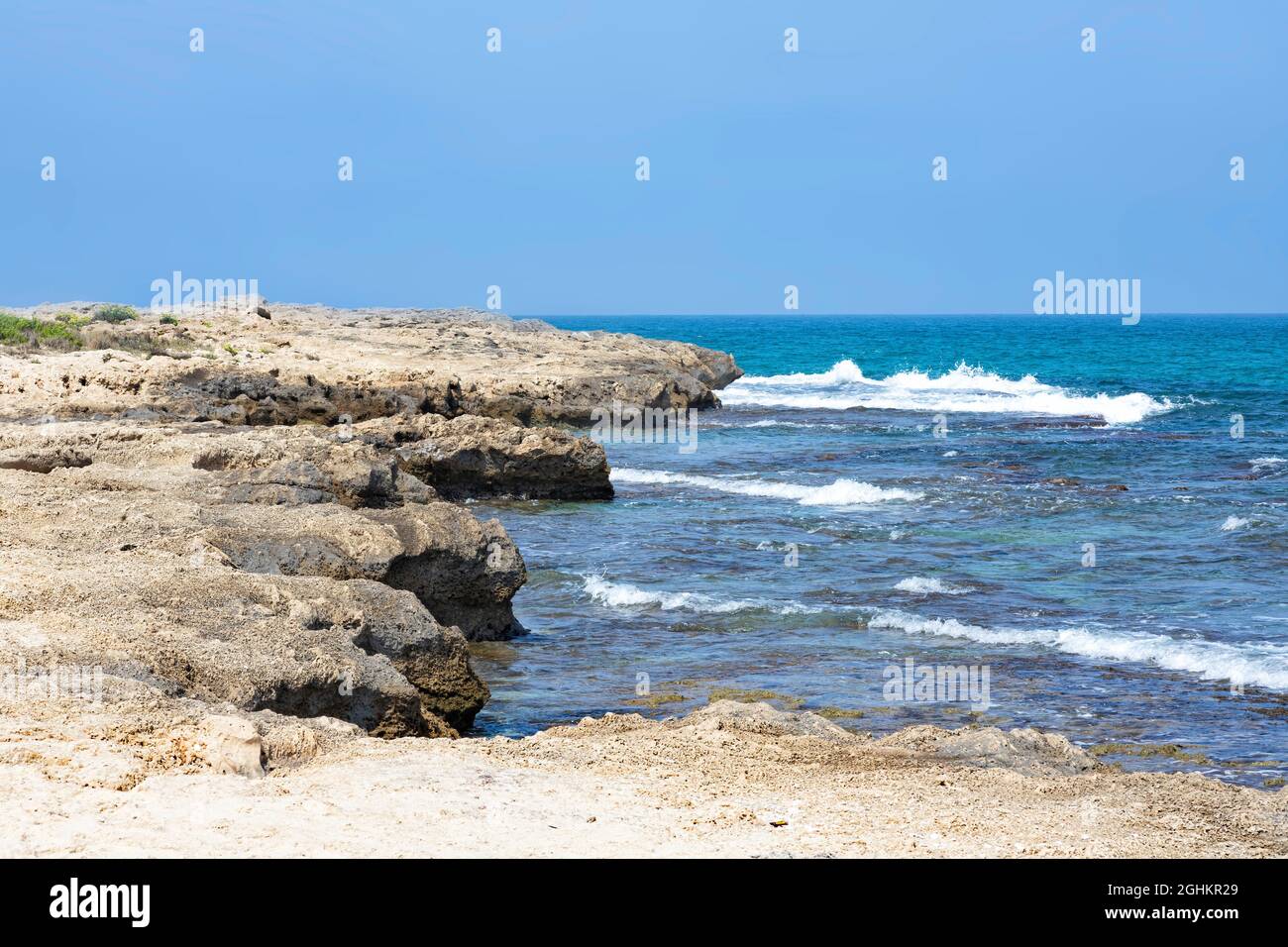 View of sandstone formations on the Mediterranean sea coast at low tide. Israel Stock Photo