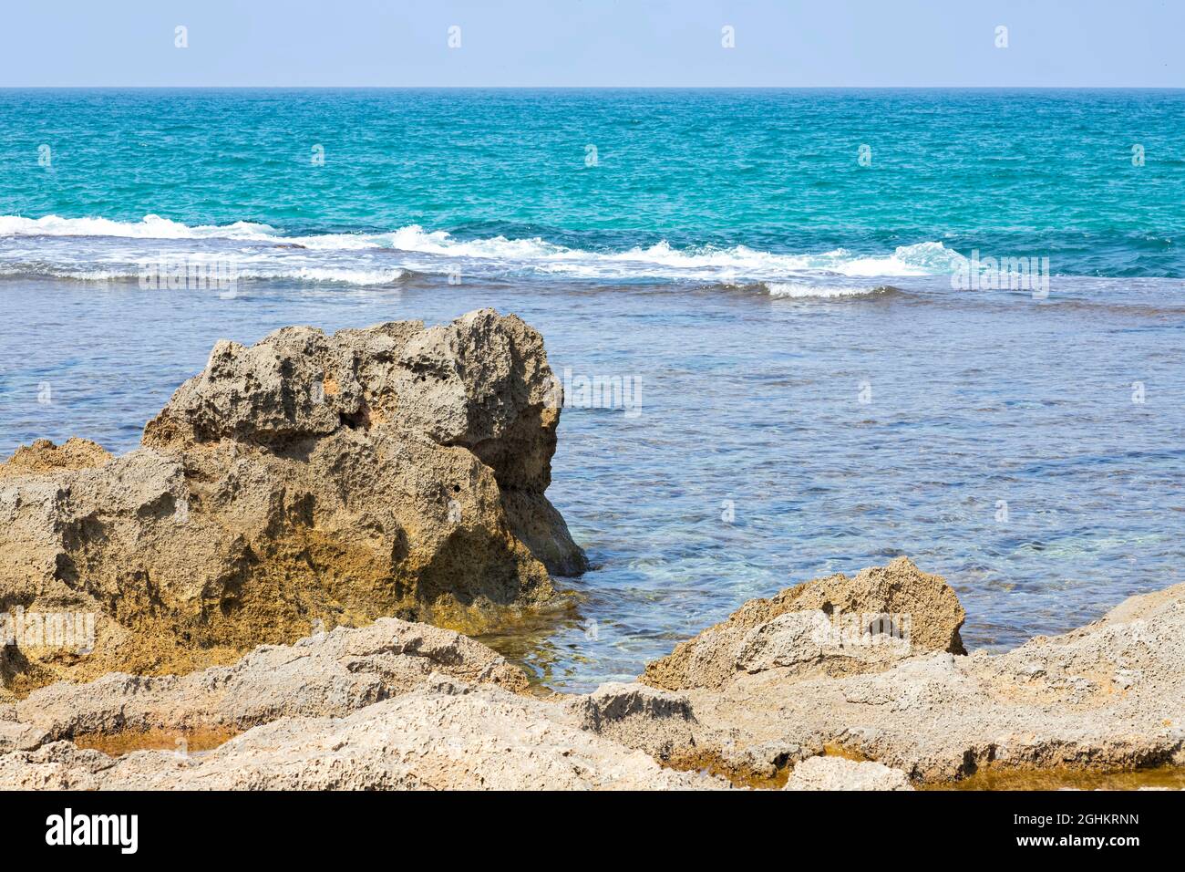 View of sandstone formations on the Mediterranean sea coast at low tide. Israel Stock Photo