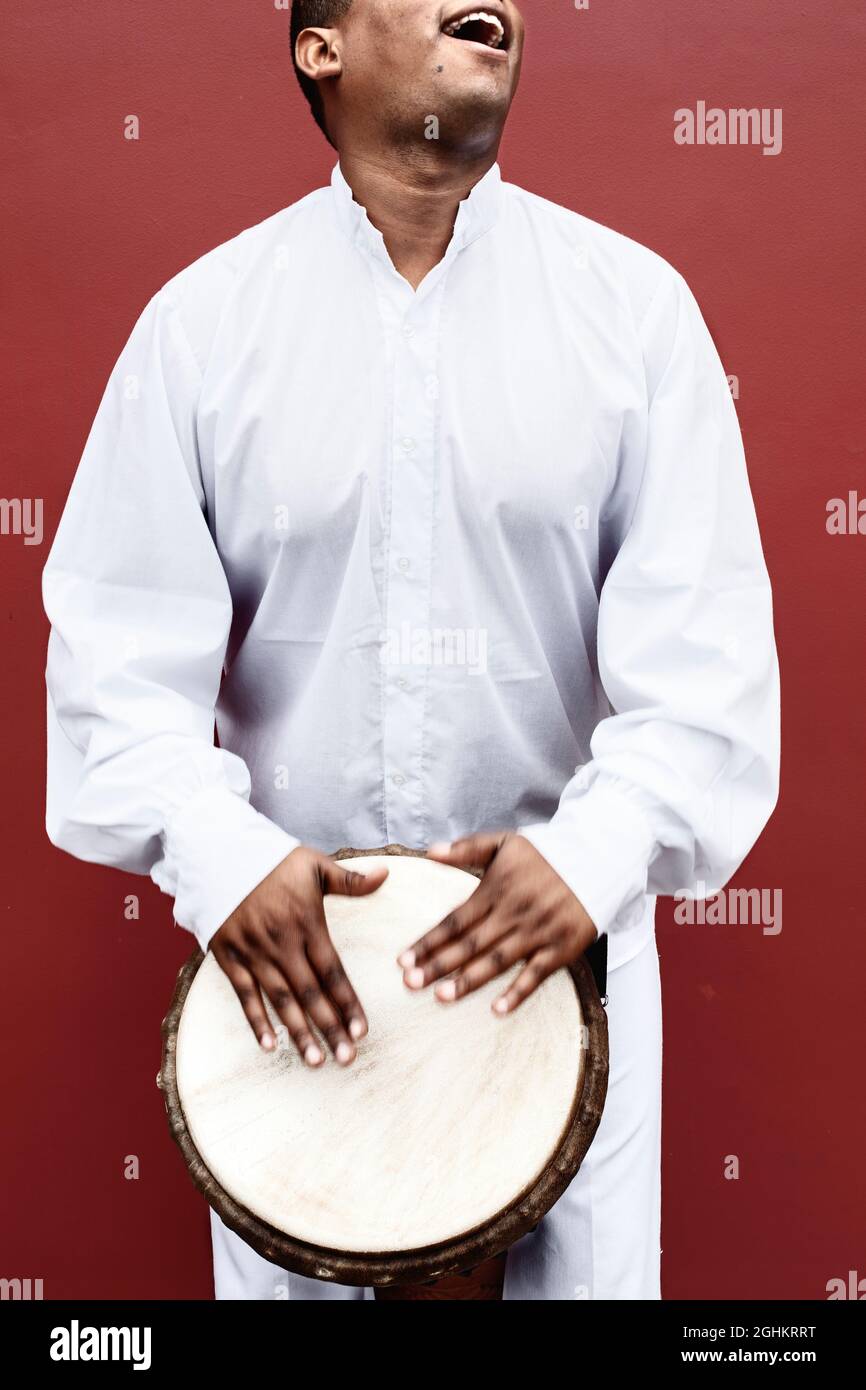 Percussionist playing drums in the streets of Barranco, Lima, Peru