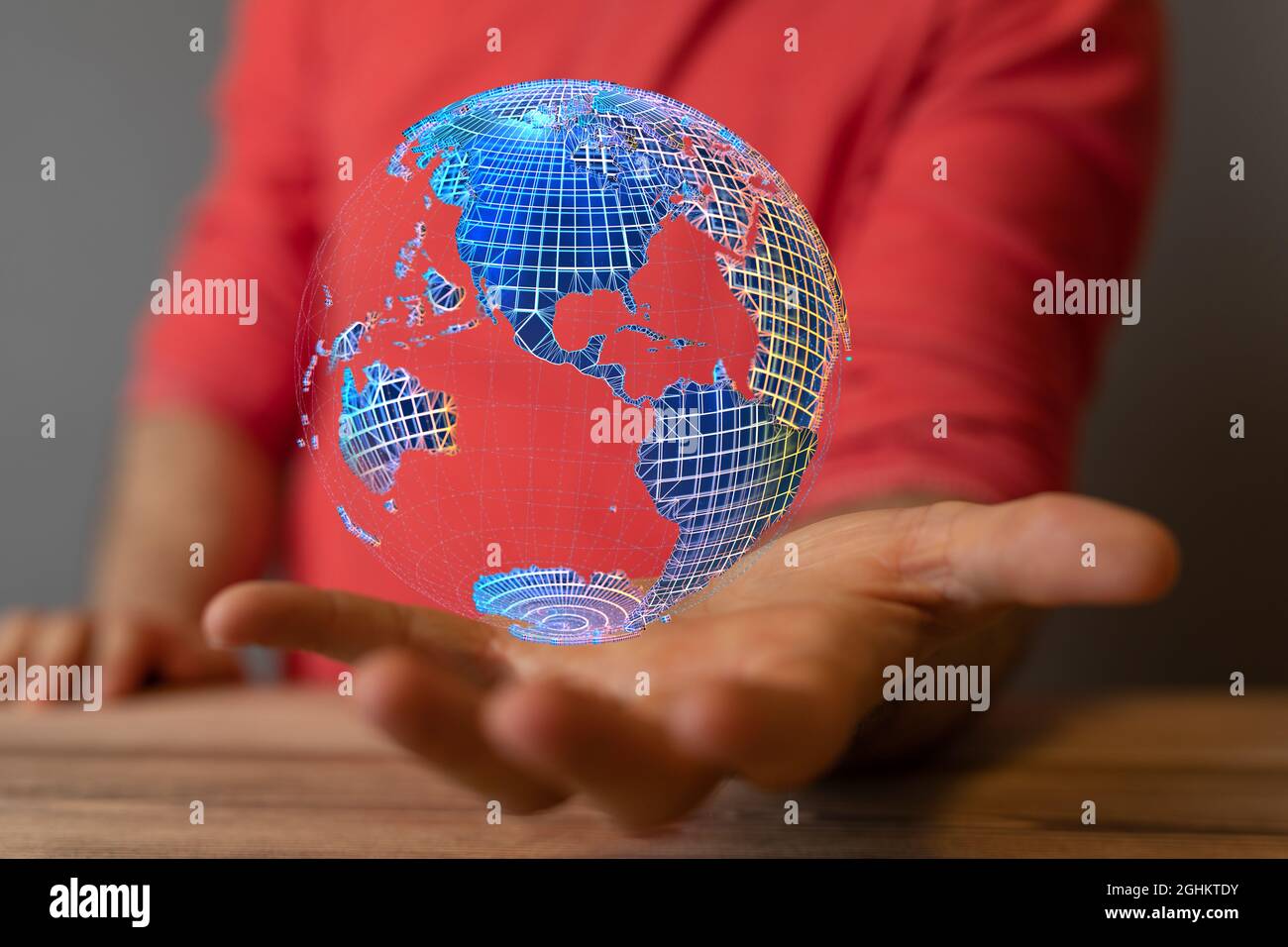 3D rendered futuristic globe hovering over a man's hand Stock Photo - Alamy