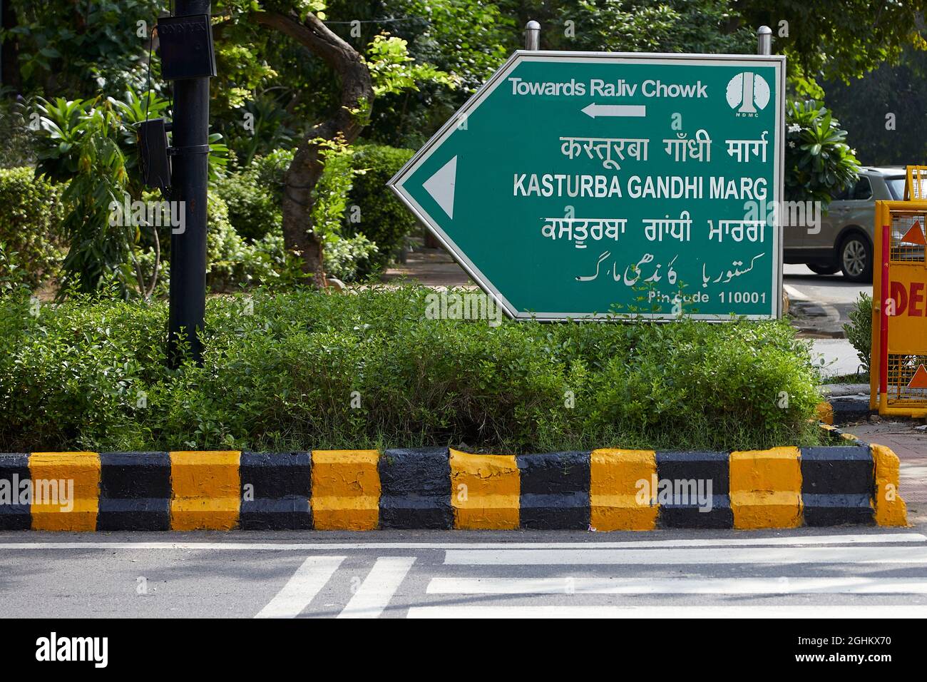 iew of a signboard indicating the Kasturba Gandhi Marg in Connaught Place. Stock Photo