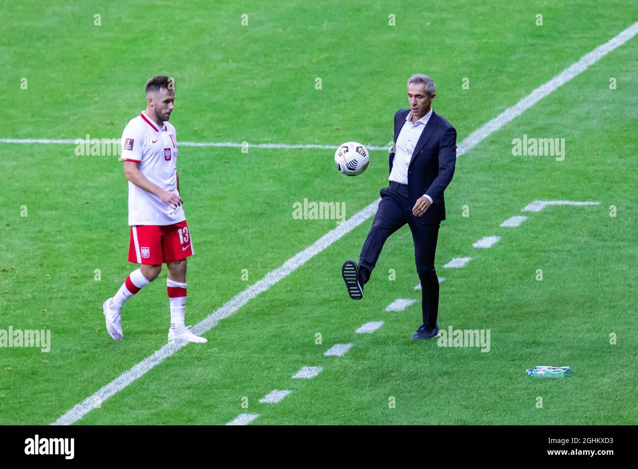 Maciej Rybus and Paulo Sousa coach of Poland in action during the FIFA World Cup 2022 Qatar qualifying match between Poland and Albania at PGE Narodowy Stadium.  (Final score; Poland 4:1 Albania) Stock Photo