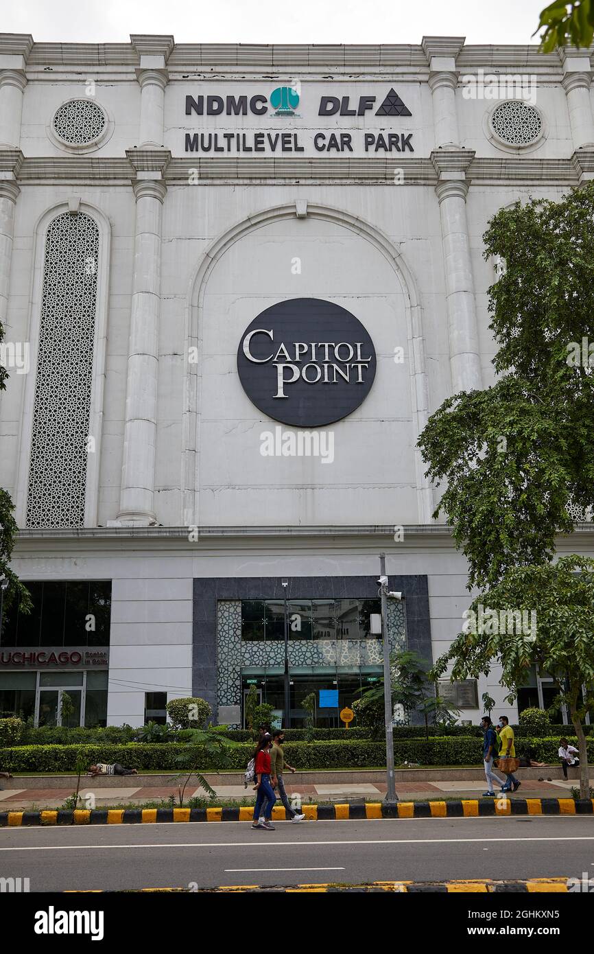 View of a modern building with multi level car parking facility in