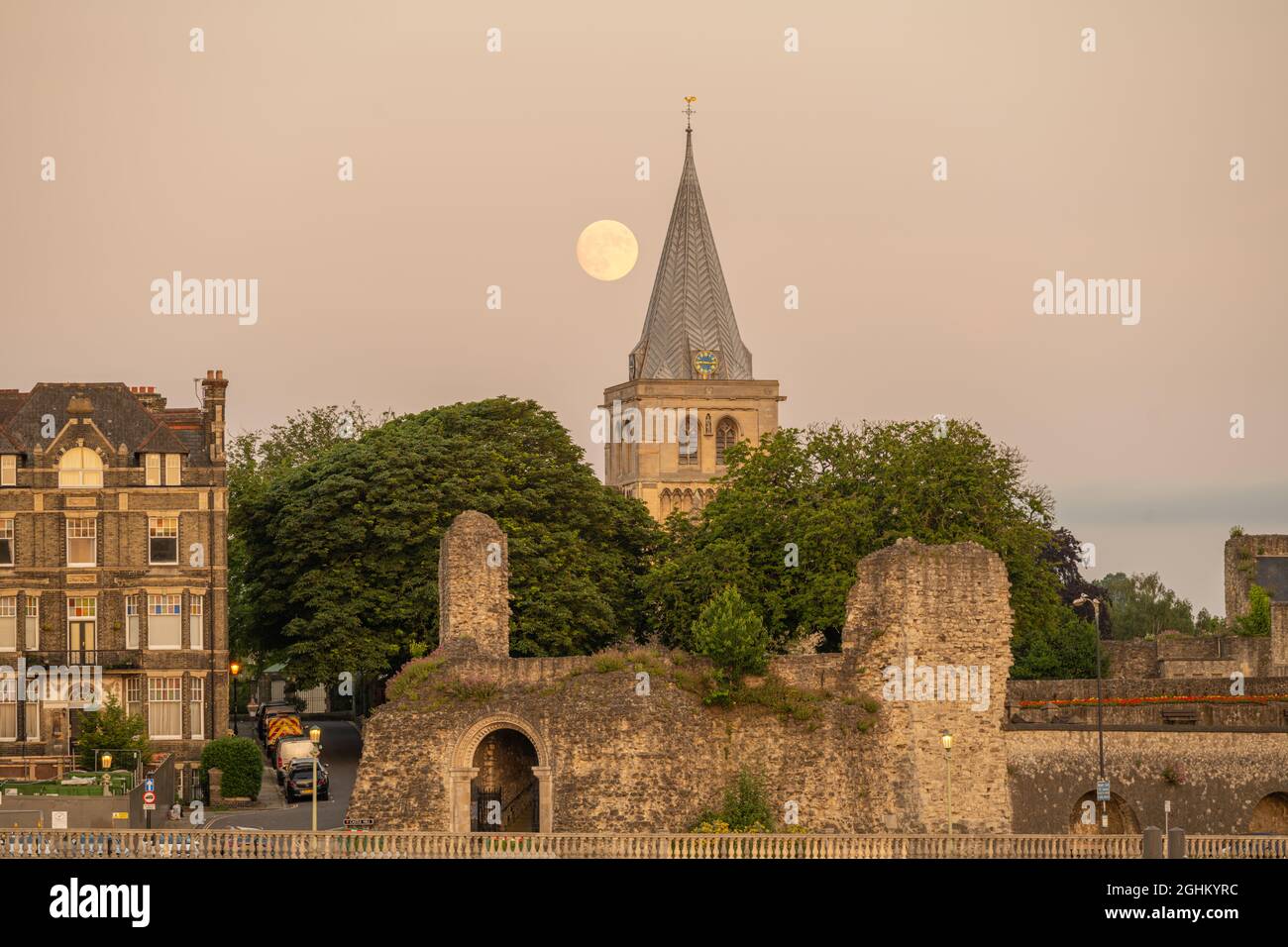 Full moon rising behind Rochester Cathedral , Rochester Kent. Stock Photo