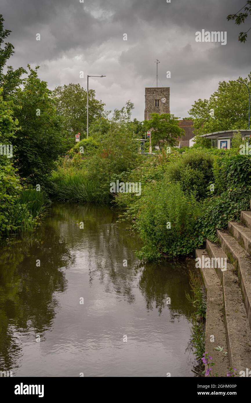 The river Darent or Darenth at Dartford Kent. Withe the tower of holy