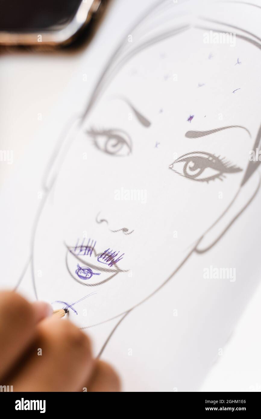 Beautician drawing zone of mimic activity in the patient chart in the ...