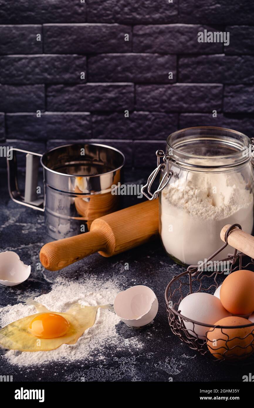 https://c8.alamy.com/comp/2GHM35Y/table-with-baking-products-and-tools-culinary-baking-concept-2GHM35Y.jpg