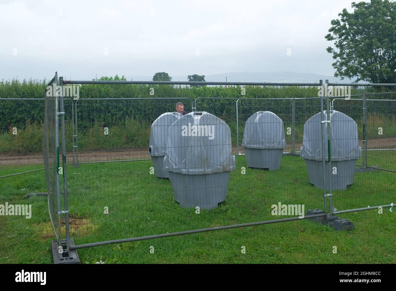 Open air urinals at a music festival. Stock Photo
