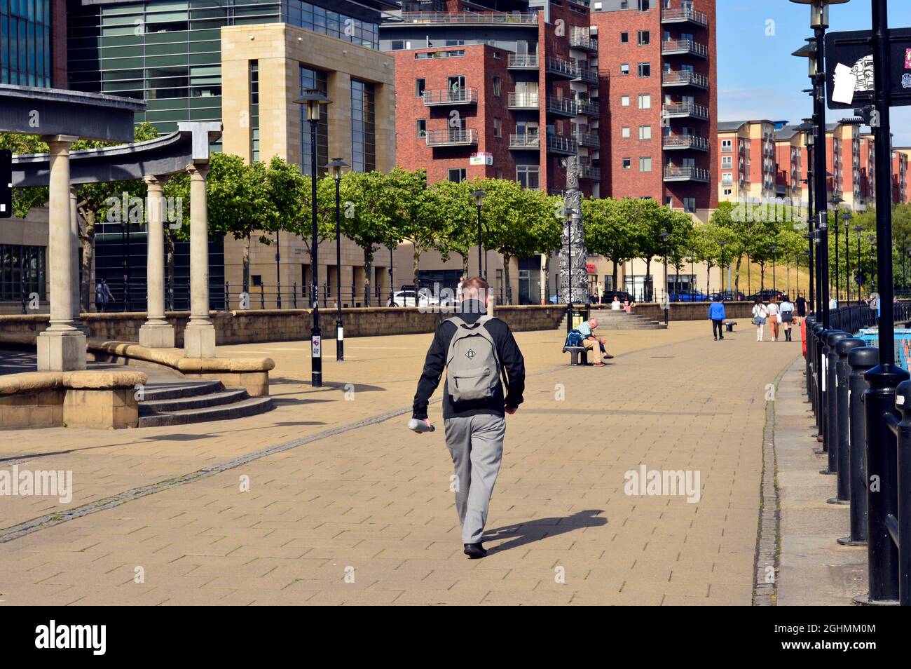NEWCASTLE. TYNE and WEAR. ENGLAND. 06-24-21. The Quayside by the Tyne, a regenerated open space overlooked by office and apartment blocks. Stock Photo