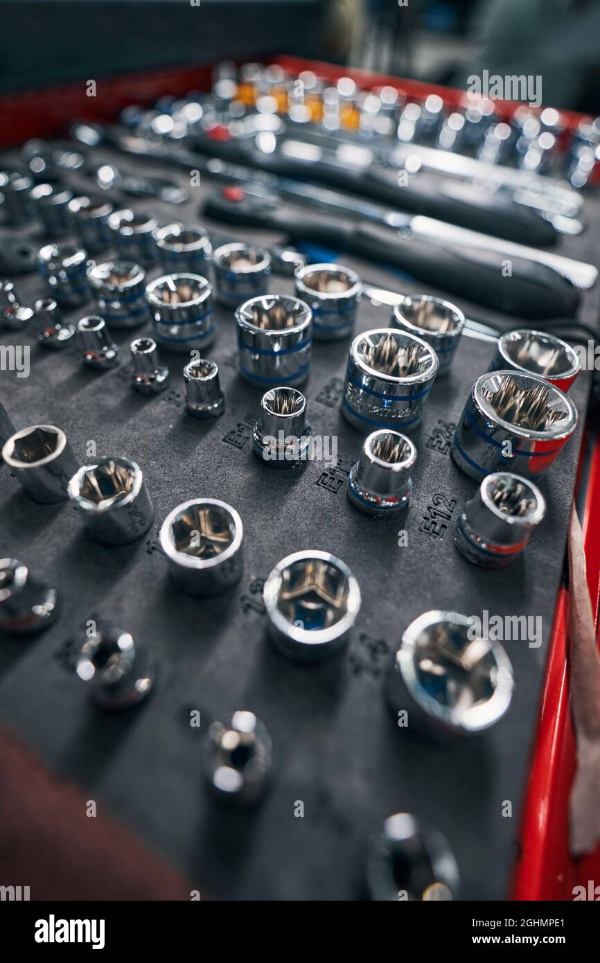 Socket heads and wrenches lying in a kit Stock Photo Alamy