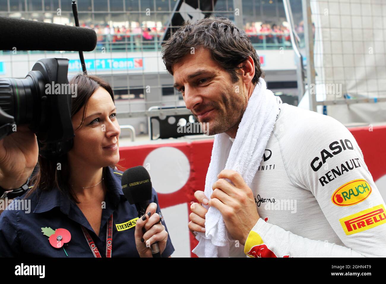 Mark Webber (AUS) Red Bull Racing with Lee McKenzie (GBR) BBC Television Presenter on the grid. 28.10.2012. Formula 1 World Championship, Rd 17, Indian Grand Prix, New Delhi, India, Race Day.  Stock Photo