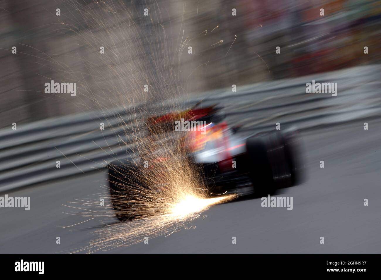 Daniel Ricciardo (AUS) Red Bull Racing RB12 sends sparks flying.  26.05.2016. Formula 1 World Championship, Rd 6, Monaco Grand Prix, Monte Carlo, Monaco, Practice Day.  Photo credit should read: XPB/Press Association Images. Stock Photo