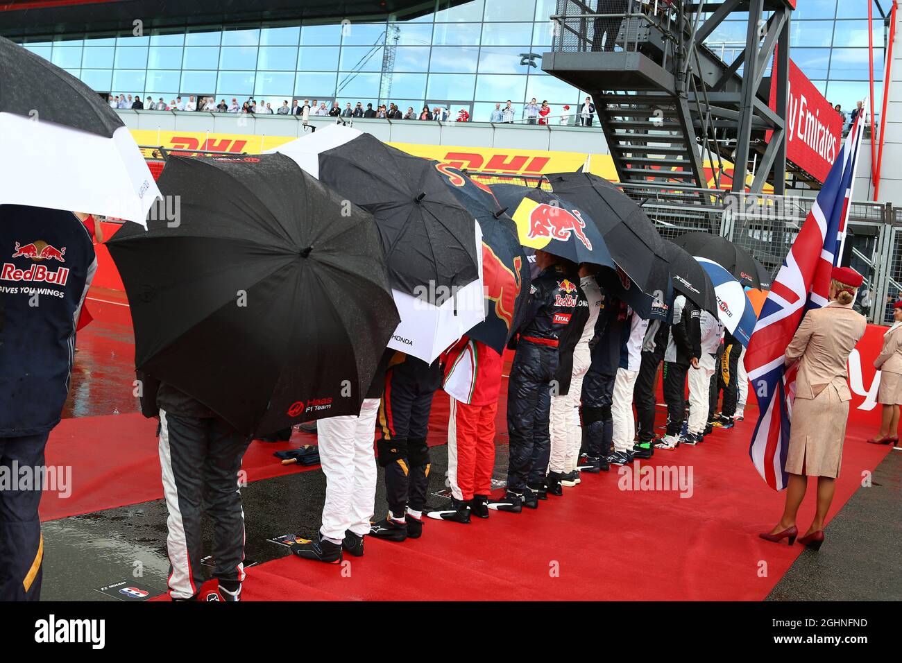 The drivers as the grid observes the national anthem. 10.07.2016