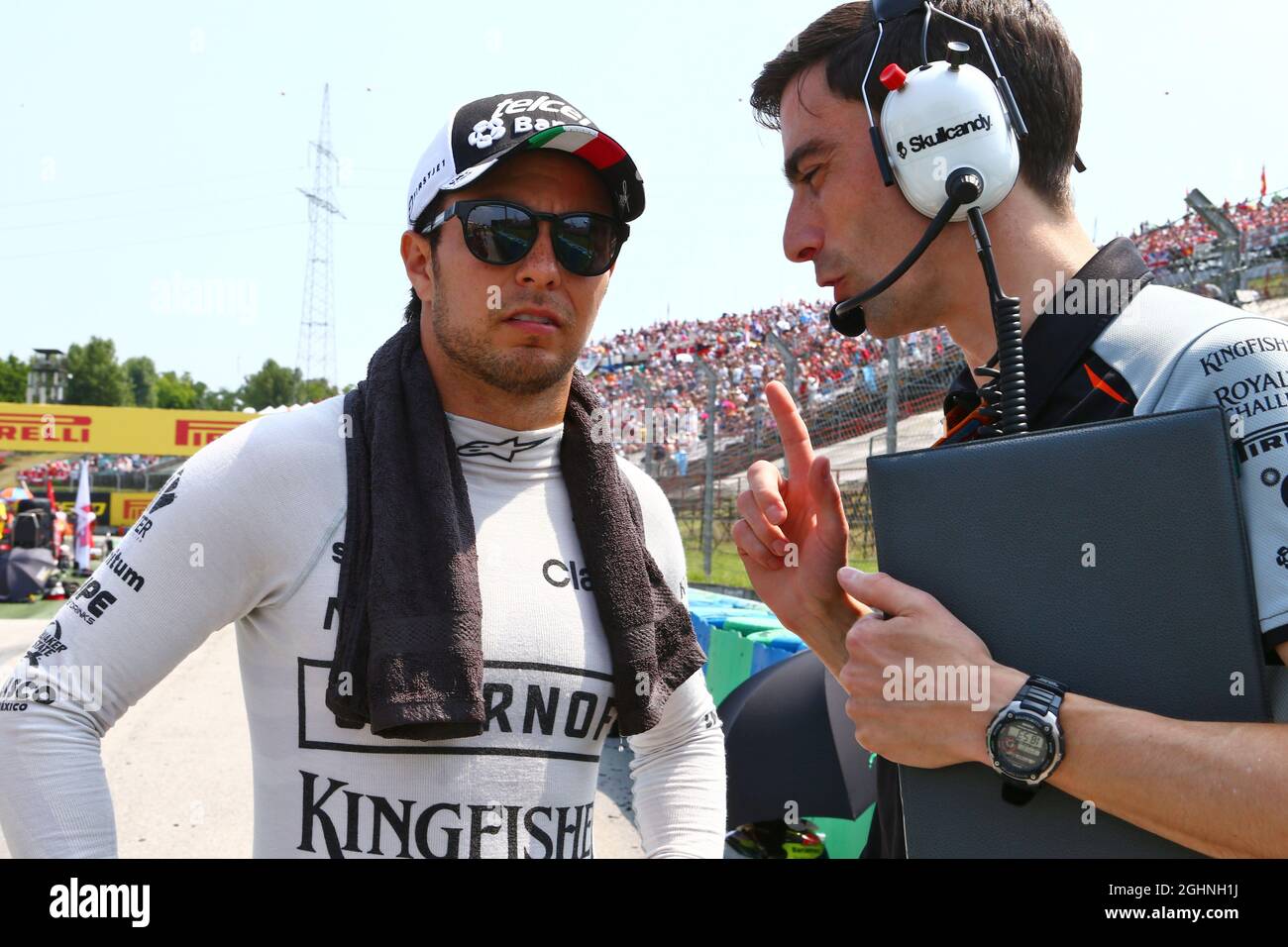 Sergio Perez (MEX) Sahara Force India F1 with Tim Wright (GBR) Sahara Force India F1 Team Race Engineer on the grid.  24.07.2016. Formula 1 World Championship, Rd 11, Hungarian Grand Prix, Budapest, Hungary, Race Day.  Photo credit should read: XPB/Press Association Images. Stock Photo