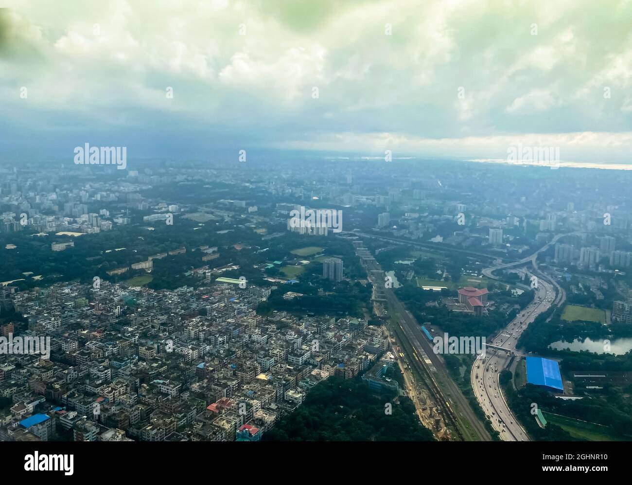 Dhaka city from above , near clouds  . Stock Photo