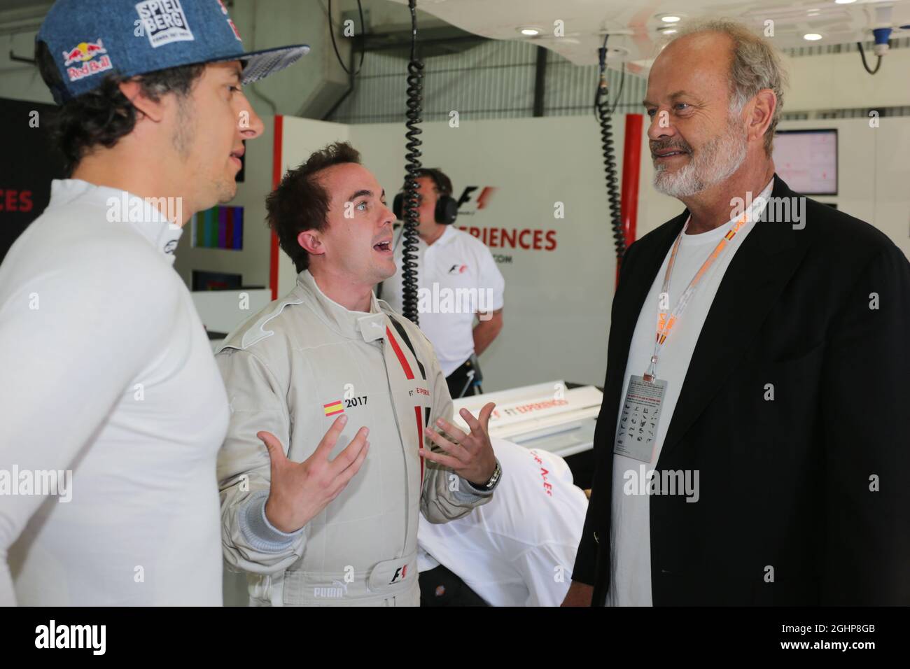 (L to R): Patrick Friesacher (AUT) with Frankie Muniz (USA) Actor and Kelsey Grammer (USA) Actor - Two-Seater F1 Experiences.  Spanish Grand Prix, Saturday 13th May 2017. Barcelona, Spain.  13.05.2017. Formula 1 World Championship, Rd 5, Spanish Grand Prix, Barcelona, Spain, Qualifying Day.  Photo credit should read: XPB/Press Association Images. Stock Photo
