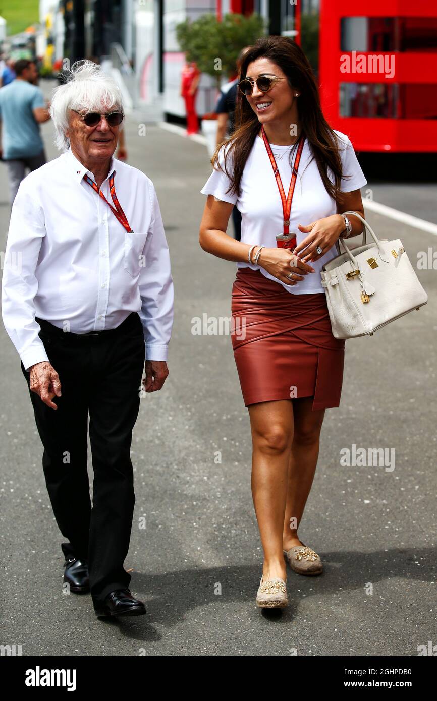 Bernie Ecclestone (GBR) with his wife Fabiana Flosi (BRA).  09.07.2017. Formula 1 World Championship, Rd 9, Austrian Grand Prix, Spielberg, Austria, Race Day.  Photo credit should read: XPB/Press Association Images. Stock Photo