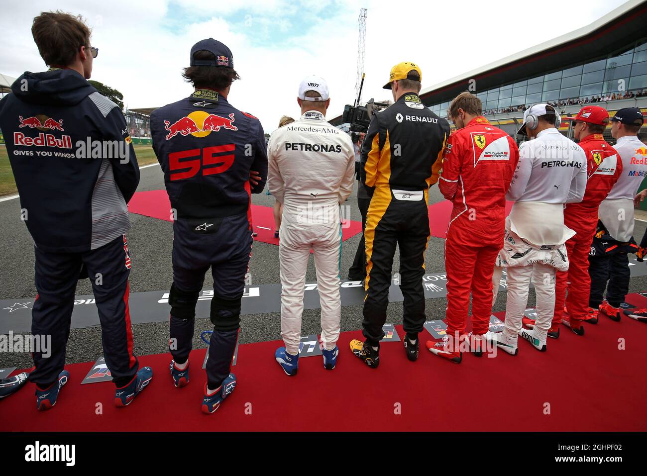 The drivers as the grid observes the national anthem. 16.07.2017