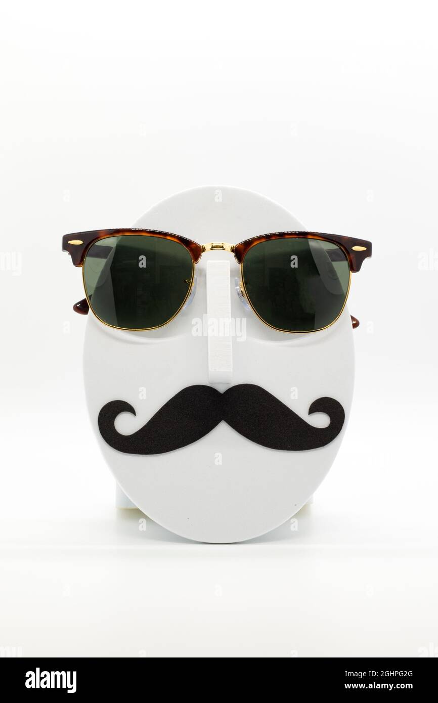 Men's fashion mannequin wearing fashionable sunglasses on white background. Stock Photo