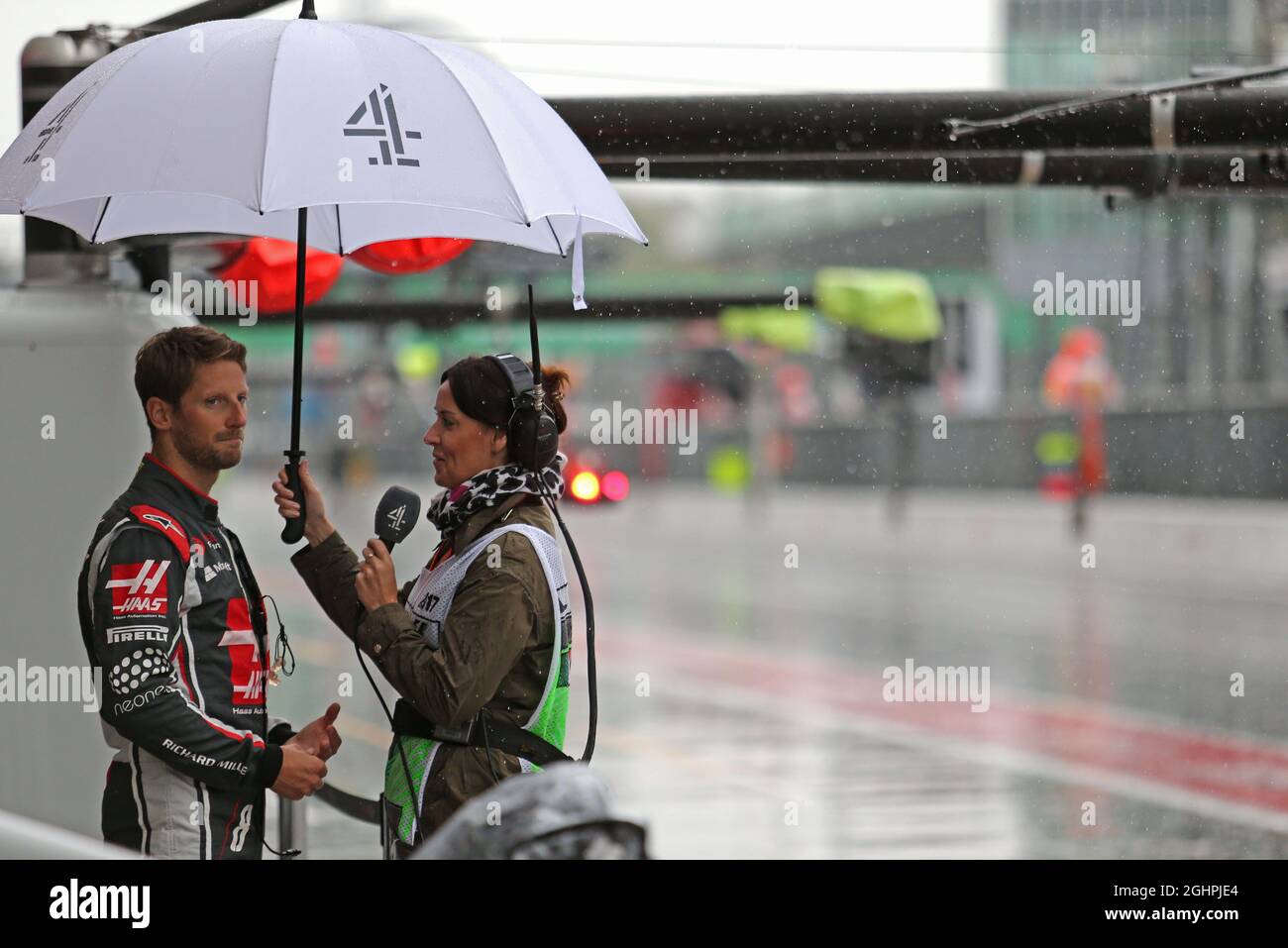 (L to R): Romain Grosjean (FRA) Haas F1 Team with Lee McKenzie (GBR) Channel 4 F1 Presenter.  02.09.2017. Formula 1 World Championship, Rd 13, Italian Grand Prix, Monza, Italy, Qualifying Day.  Photo credit should read: XPB/Press Association Images. Stock Photo