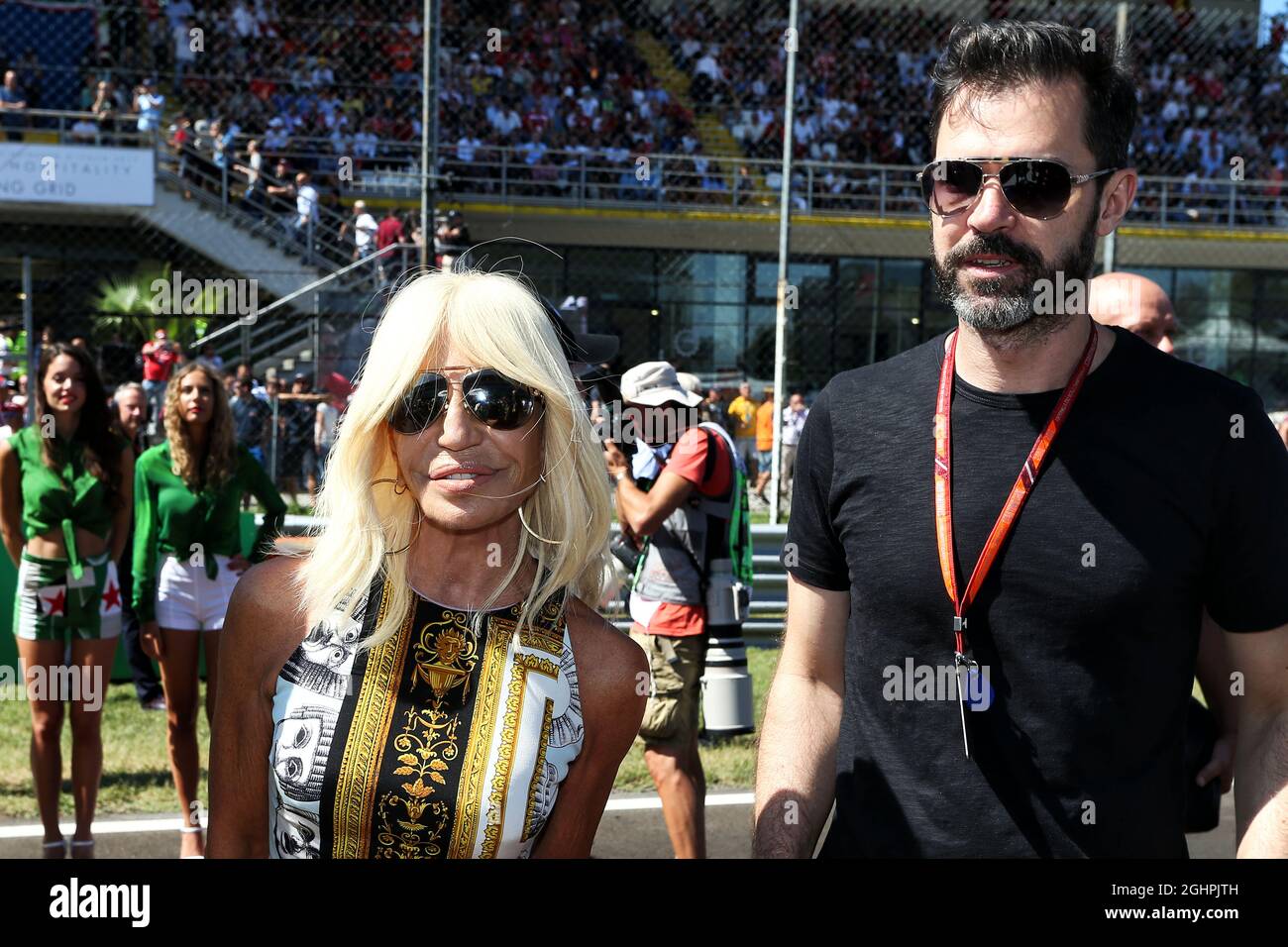 L to R): Donatella Versace (ITA) Versace Vice President with Marc Hynes  (GBR) on the grid. 03.09.2017. Formula 1 World Championship, Rd 13, Italian  Grand Prix, Monza, Italy, Race Day. Photo credit