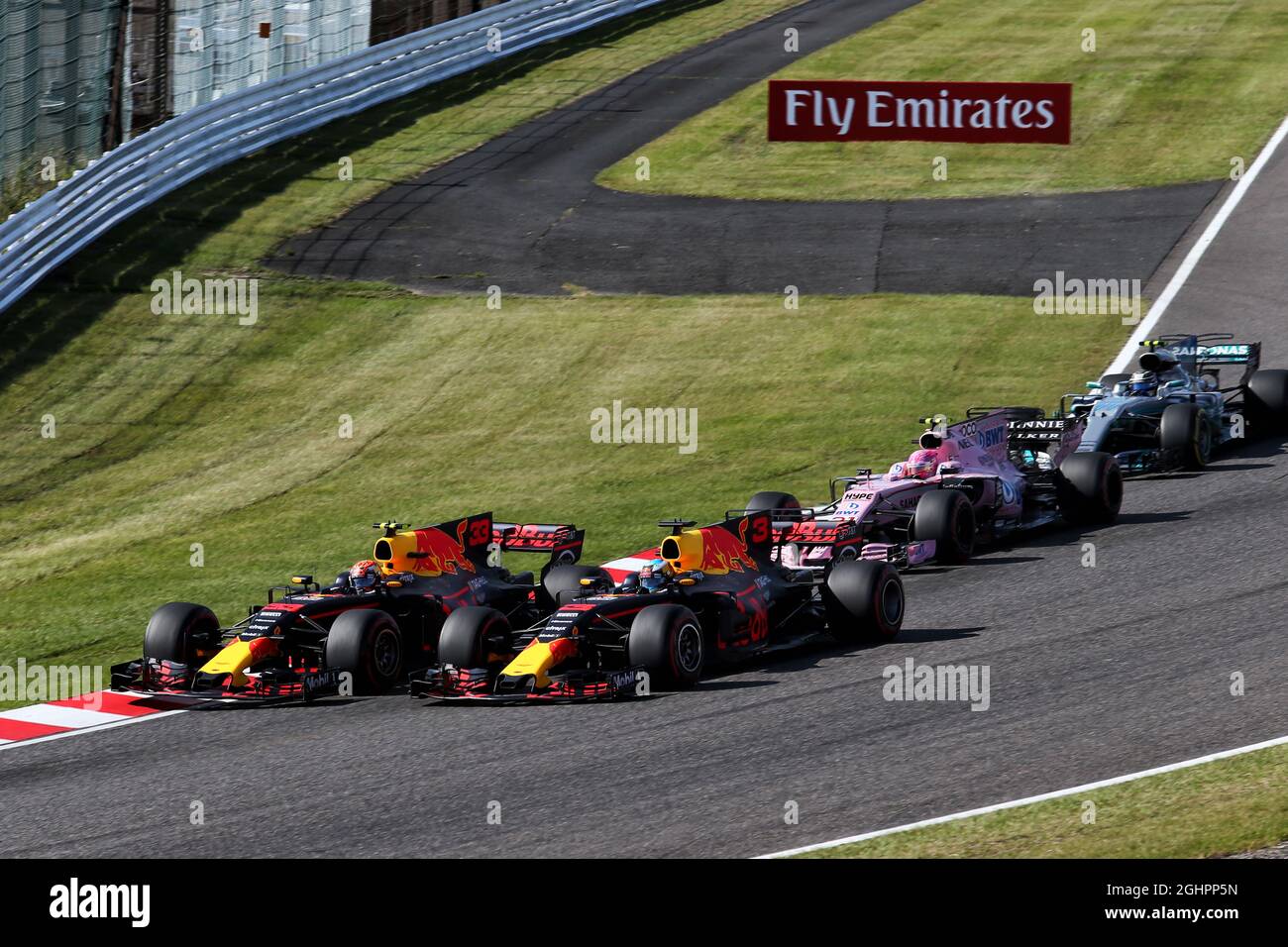 Max Verstappen (NLD) Red Bull Racing RB13 andd team mate Daniel Ricciardo (AUS) Red Bull Racing RB13 battle for position at the start of the race.  08.10.2017. Formula 1 World Championship, Rd 16, Japanese Grand Prix, Suzuka, Japan, Race Day.  Photo credit should read: XPB/Press Association Images. Stock Photo