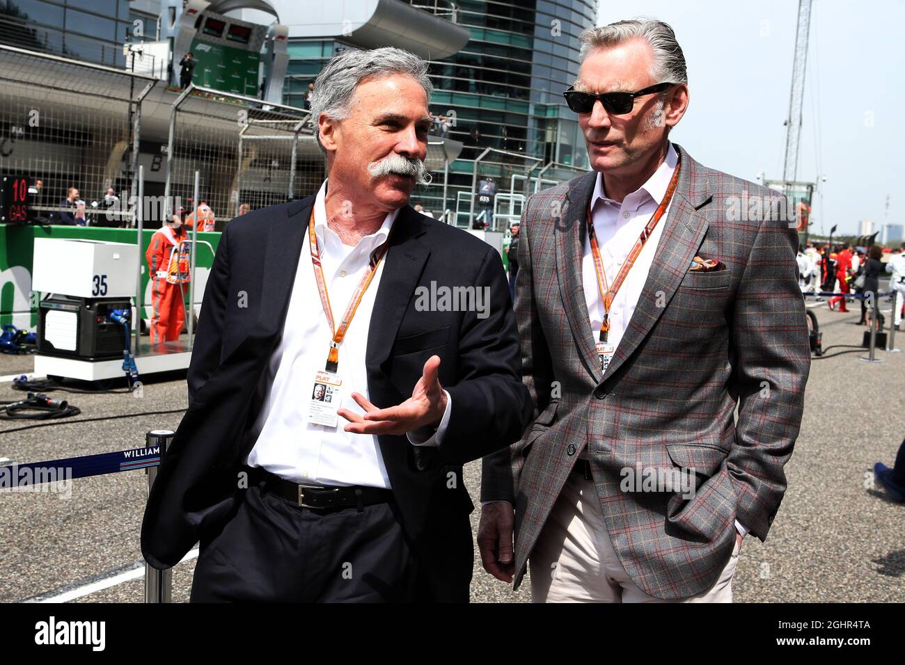 (L to R): Chase Carey (USA) Formula One Group Chairman with Sean Bratches (USA) Formula 1 Managing Director, Commercial Operations on the grid.  15.04.2018. Formula 1 World Championship, Rd 3, Chinese Grand Prix, Shanghai, China, Race Day.  Photo credit should read: XPB/Press Association Images. Stock Photo