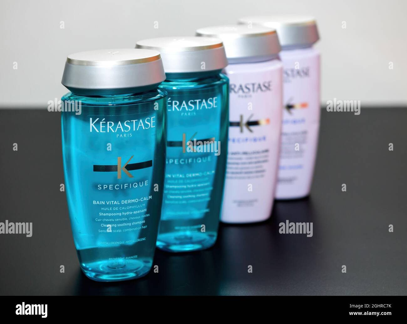 Presentation row of four new Kerastase Paris specifique luxury shampoo Stock Photo