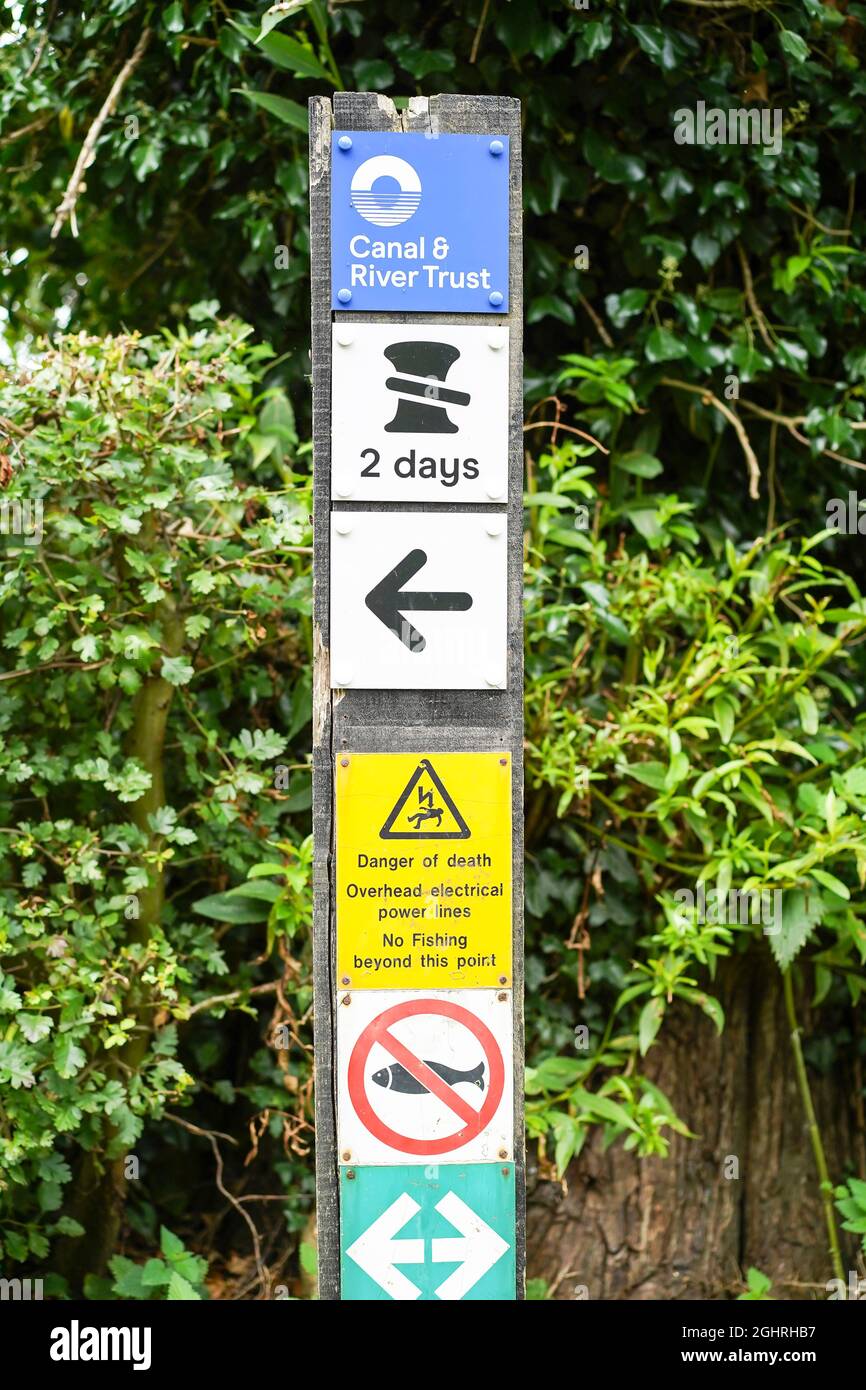 Canal and River Trust  sign marker on towpath by UK canal. Stock Photo