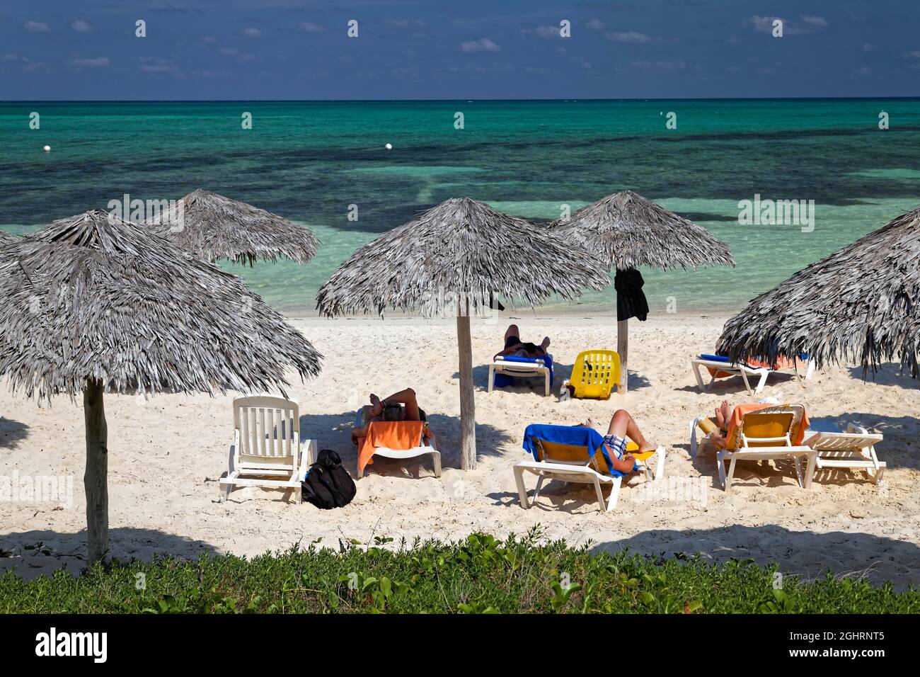 Sandy beach beach, sun loungers, palm leaf parasols, lagoon, Hotel ...