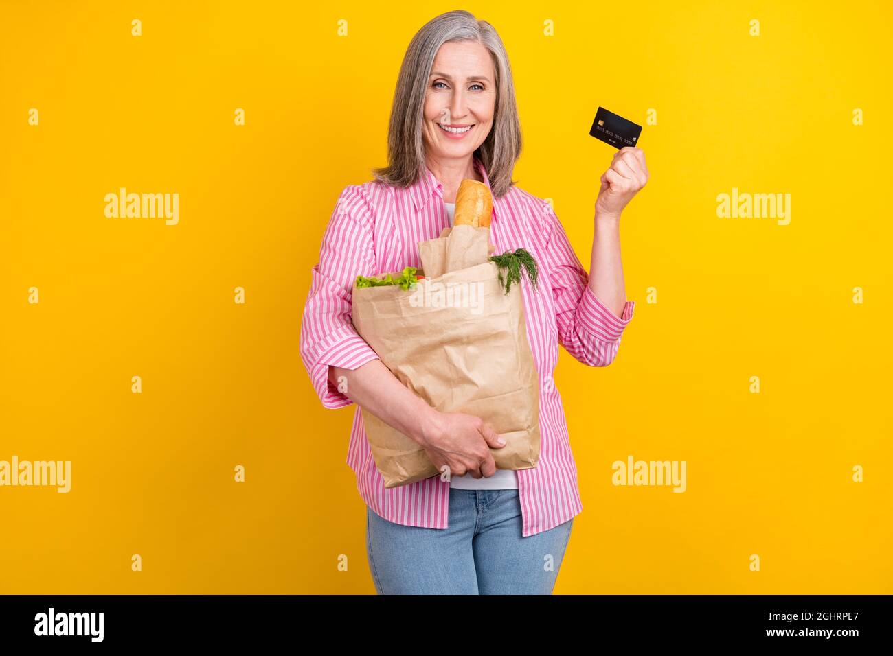 Photo of aged woman happy positive smile buyer pay credit card store