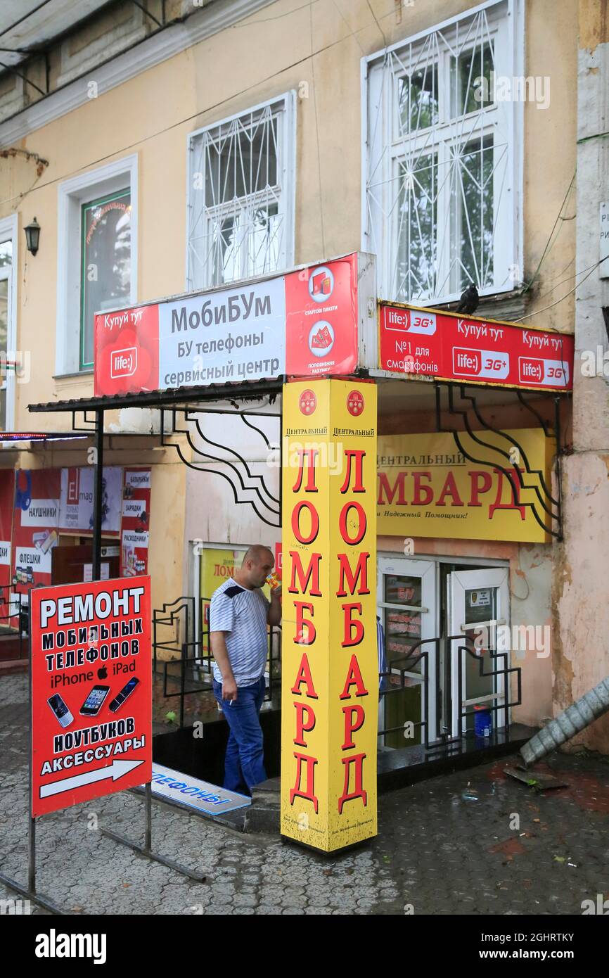 Repair shop for mobile phones in Risheljevskaja Street, Odessa, Ukraine Stock Photo