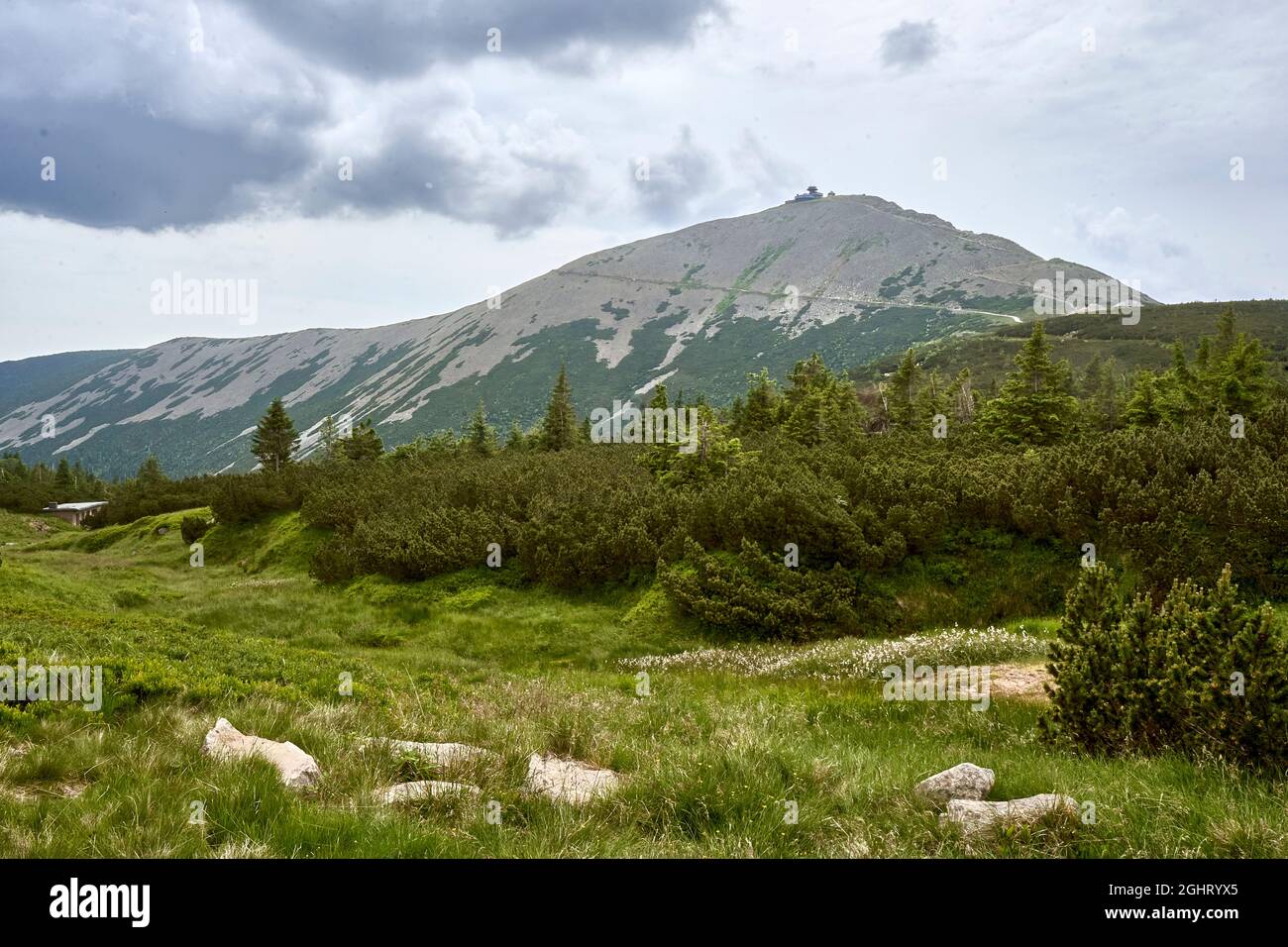 Sniezka peak 05 June 2021 -View at Sniezka peak in Karkonosze mountain at border Poland and Chech Republic. Stock Photo