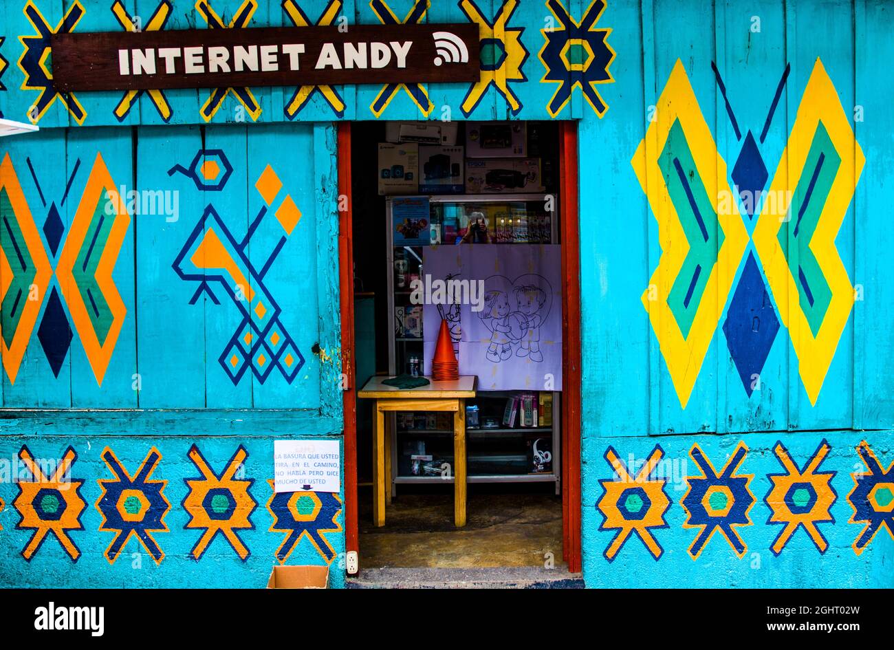 Internet shop, houses painted with traditional Mayan patterns, Eupithecia (Catarina) Palopo, Lake Atitlan, Santa Catarina Palopo, Guatemala Stock Photo