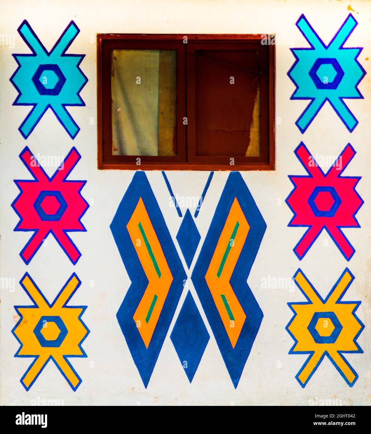 Houses painted with traditional Mayan patterns, Eupithecia (Catarina) Palopo, Lake Atitlan, Santa Catarina Palopo, Guatemala Stock Photo