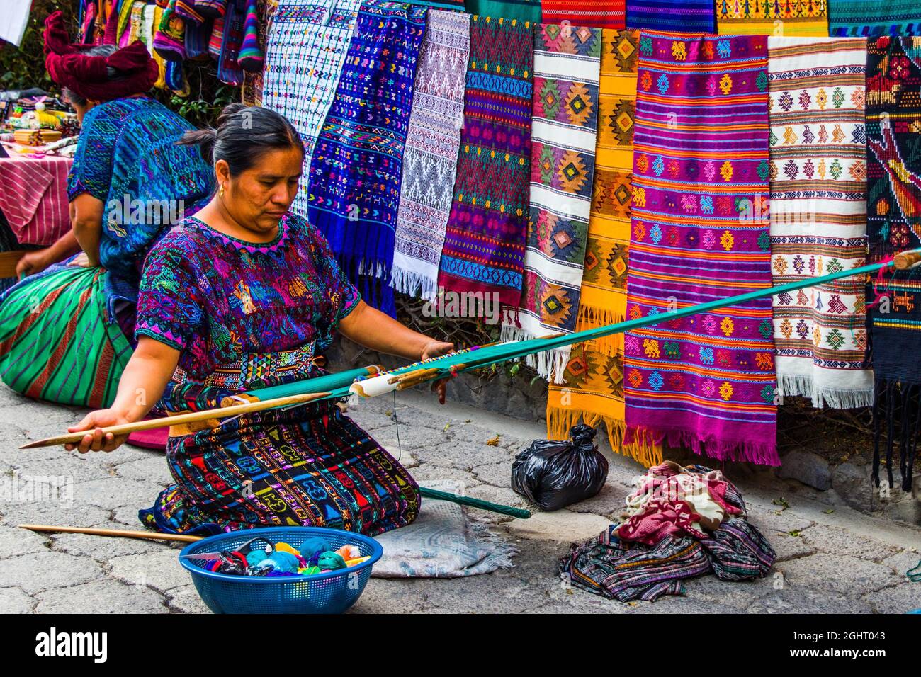 Women with traditional handlooms, Eupithecia (Catarina) Palopo, Lake Atitlan, Santa Catarina Palopo, Guatemala Stock Photo