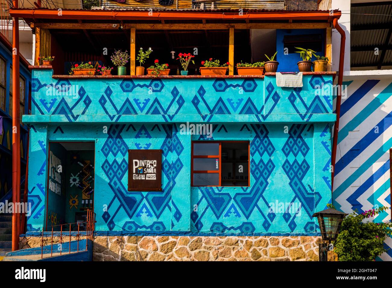 Houses painted with traditional Mayan patterns, Eupithecia (Catarina) Palopo, Lake Atitlan, Santa Catarina Palopo, Guatemala Stock Photo