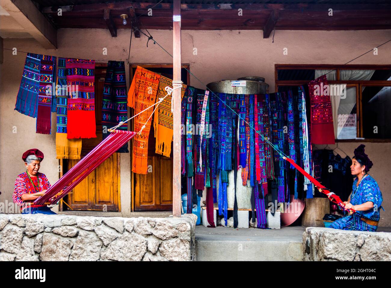 Women with traditional handlooms, Eupithecia (Catarina) Palopo, Lake Atitlan, Santa Catarina Palopo, Guatemala Stock Photo