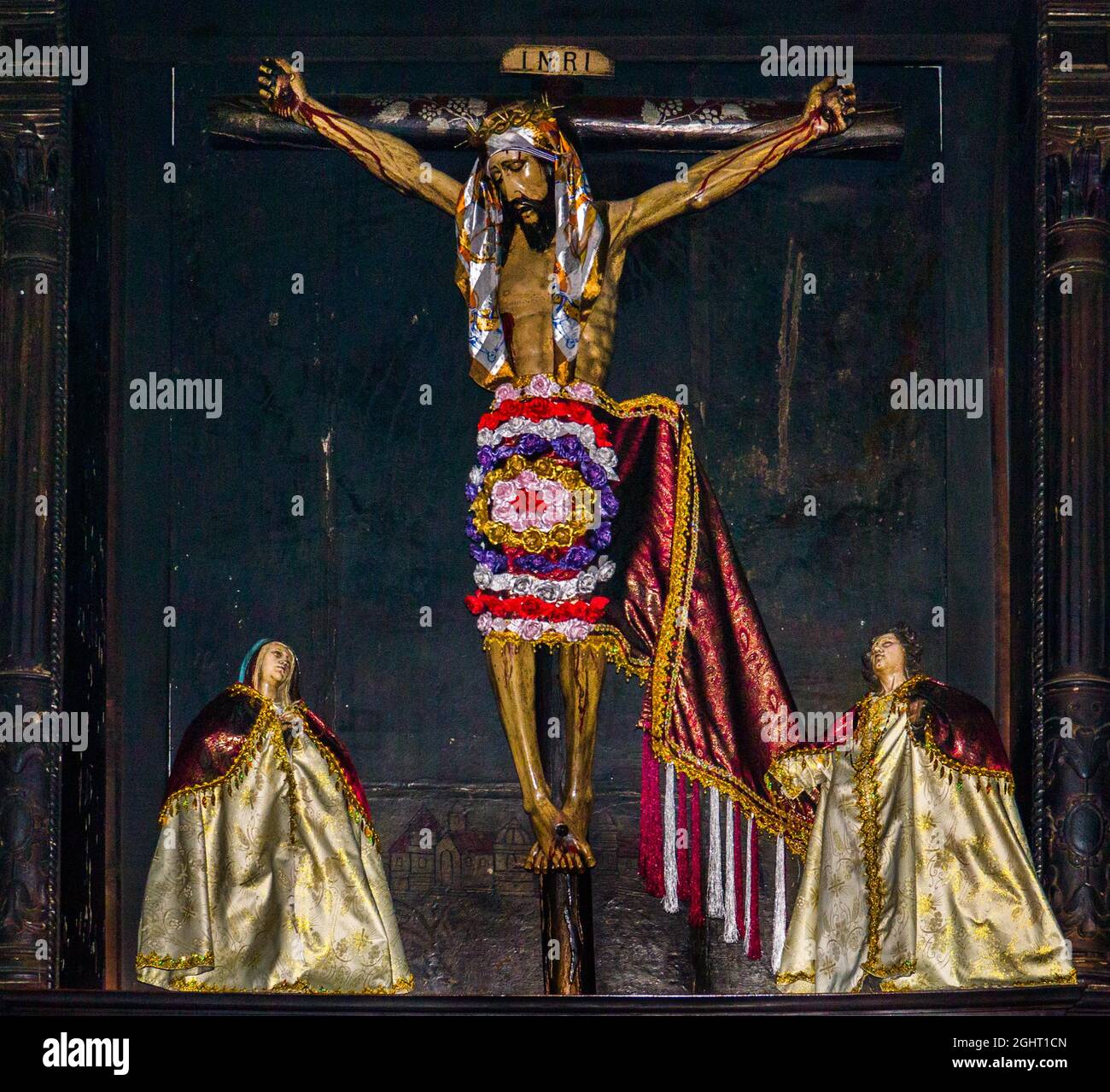 Wooden figures of the saints, dressed in traditional traditional costume, colonial-era Iglesia Parroquial Santiago Apostol of 1566, Santiago Stock Photo